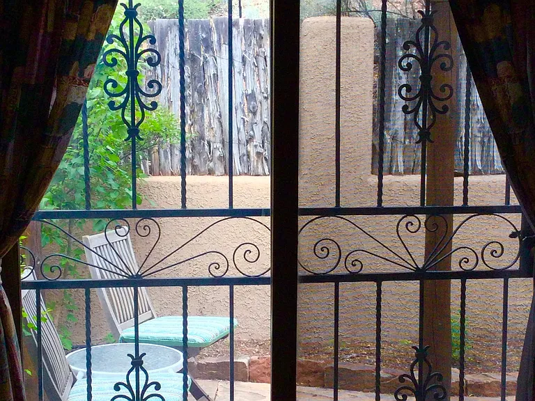 The slider in the master bedroom does backup duty as the window. The security door allows you to safely leave the door open for fresh air as much as you desire.