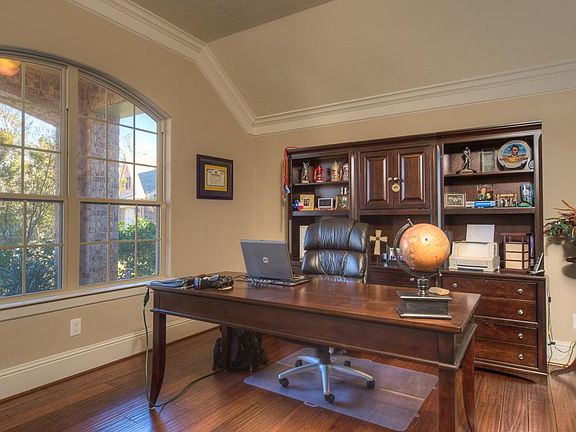 Large study with plenty of room for a large credenza or book shelves.  This is a much needed space in today's home.  The study windows look out onto the front yard.