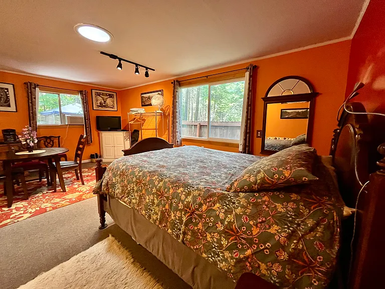 Not shown (new wardrobe and dresser and larger TV. I want to include this photo for perspective so you get a feel for the space.