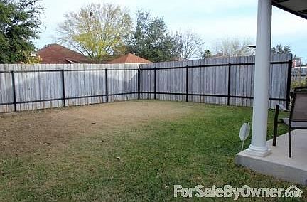 Back Exterior
						:
						Fenced backyard with adjacent fenced drive is perfect for a gorgeous evening
