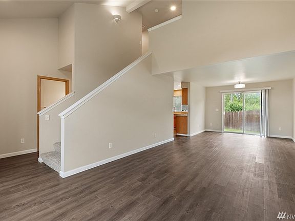 The living room flows through to the dining space, creating one huge area for entertaining and everyday living. 