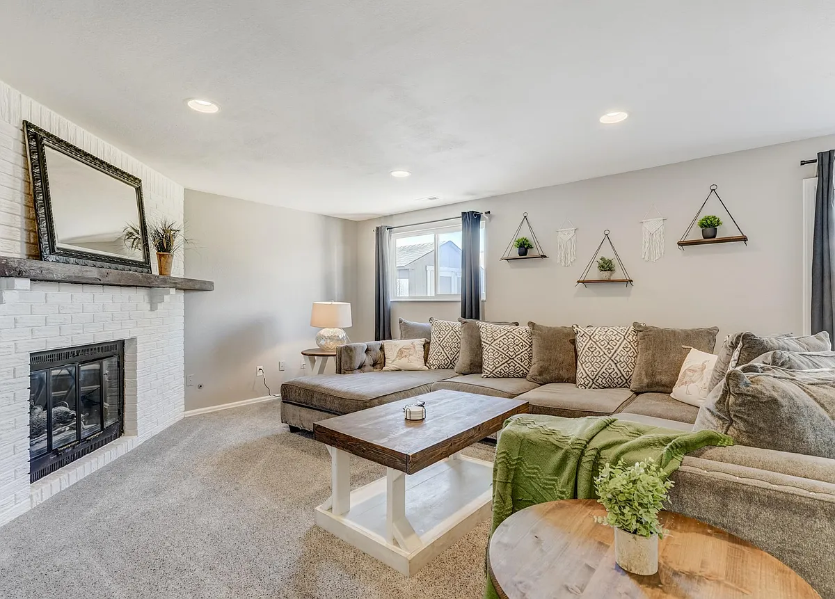 Living room offers a large and very comfortable sectional! - Ptarmigan Ln