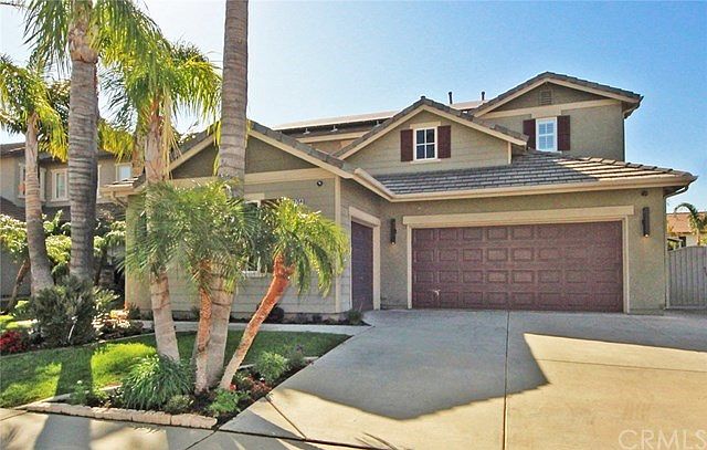 Gorgeous home with 3 car garage & concrete tile roof