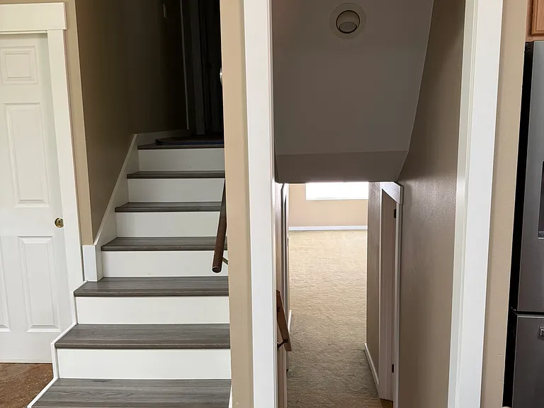 This photo shows how one access the upper and lower levels from the main floor.