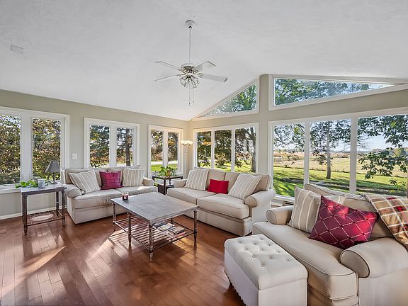 Living room with vaulted ceilings and lots of natural light!