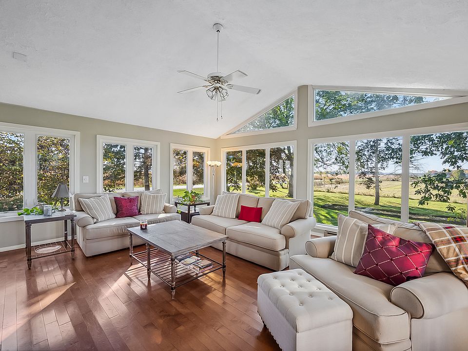 Living room with vaulted ceilings and lots of natural light!