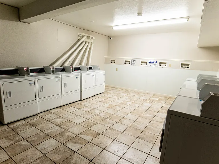 Two Laundry Rooms with PayRange Eqipped Washers & Dryers