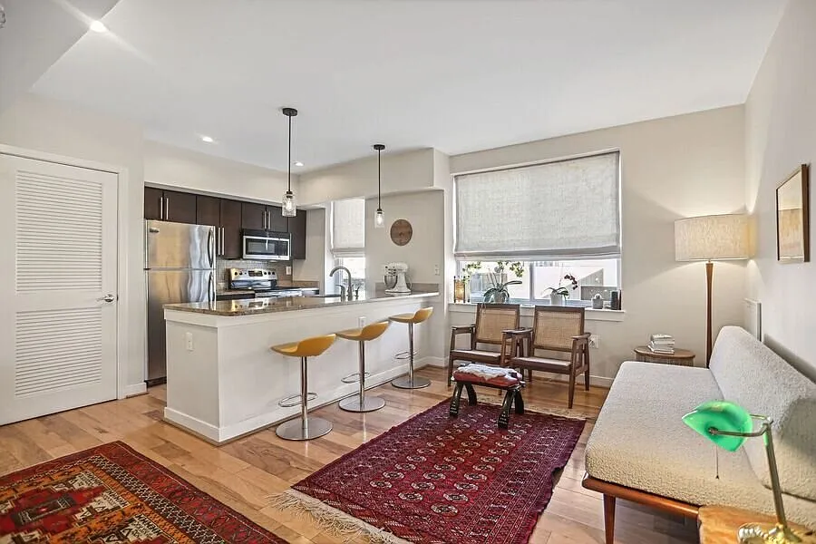 Bright 2-Bedroom Condo in Hill East - Parking and Storage Included + 1 Month Free! — Photo 1