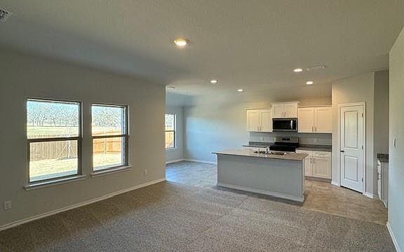 Kitchen - All Home and community information, including pricing, included features, terms, availability and amenities, are subject to change at any time without notice or obligation. All Drawings, pictures, photographs, video, square footages, floor plans, elevations, features, colors and sizes are approximate for illustration purposes only and will vary from the homes as built.