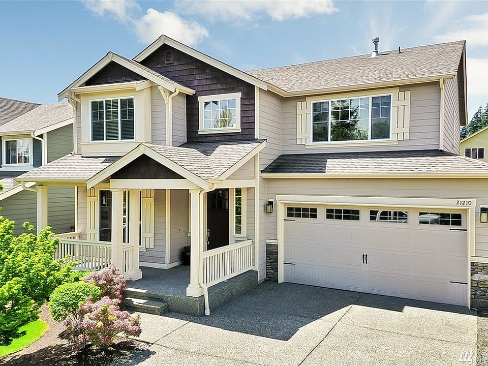 Wonderful landscaped yard, double car garage and front porch! 