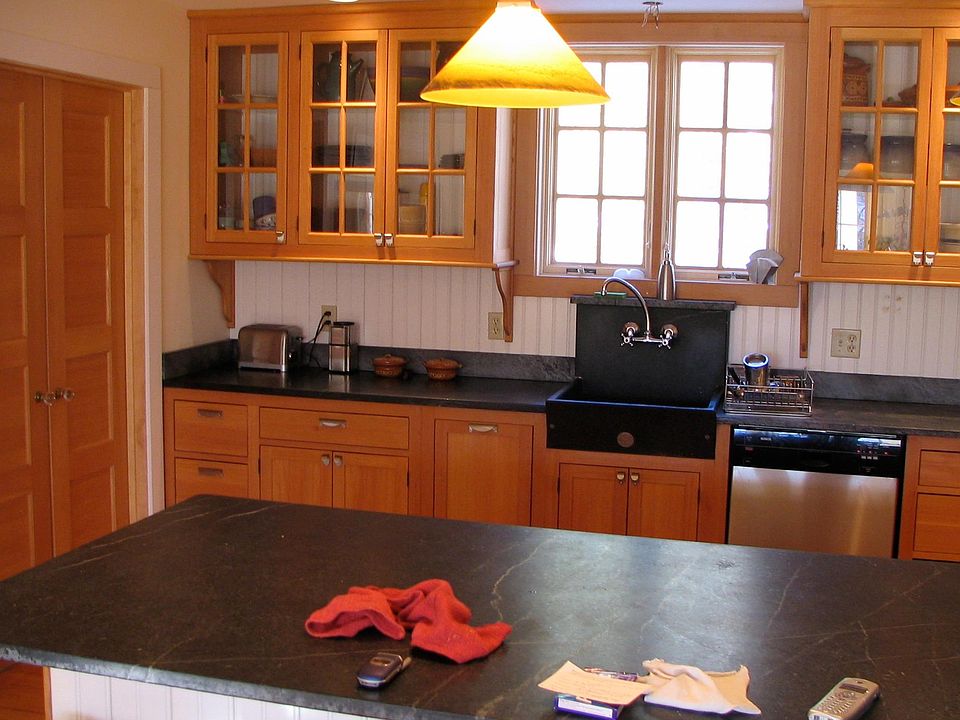 Kitchen with custom fir cabinetry, soapstone sink and counters.