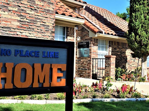 Sevilla Apartments signage
