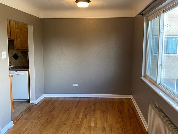 View into dining area / office space to entrance of kitchen