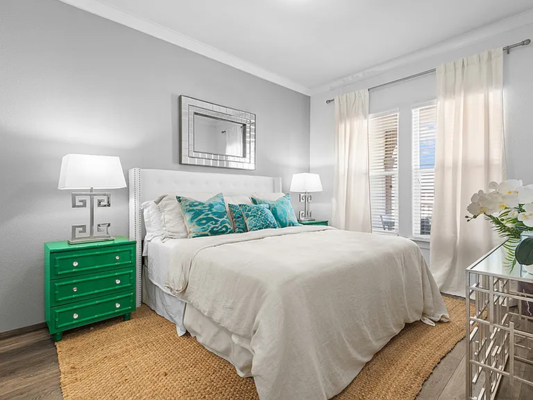 Experience tranquility in this elegantly designed bedroom featuring chic decor and modern comforts. Experience tranquility in this elegantly designed bedroom featuring chic decor and modern comforts.