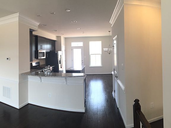 Kitchen w/ wood floors 