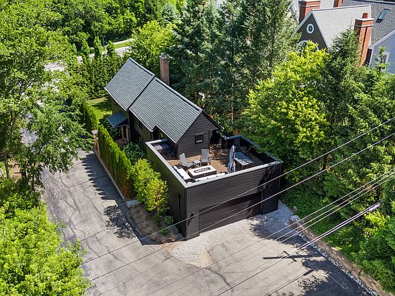 Private second story balcony off of Primary bedroom suite. Also has an outdoor spiral staircase.