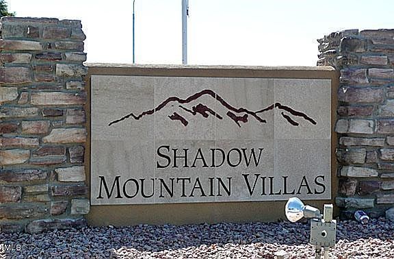 Rhonda Baseline Mountain shadows sign cl