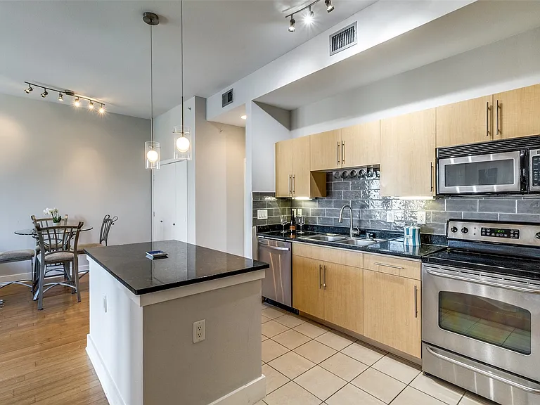 Open kitchen with island bar.