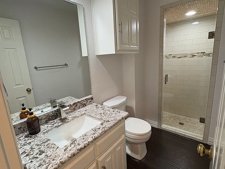 DOWN STAIRS FULL BATHROOM