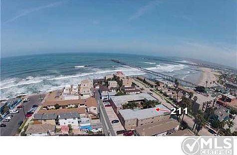 Located steps to the ocean and OB Pier. The Pacific is your back yard!