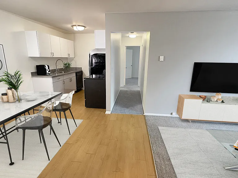 Adaptable living space in open floor plan apartment.