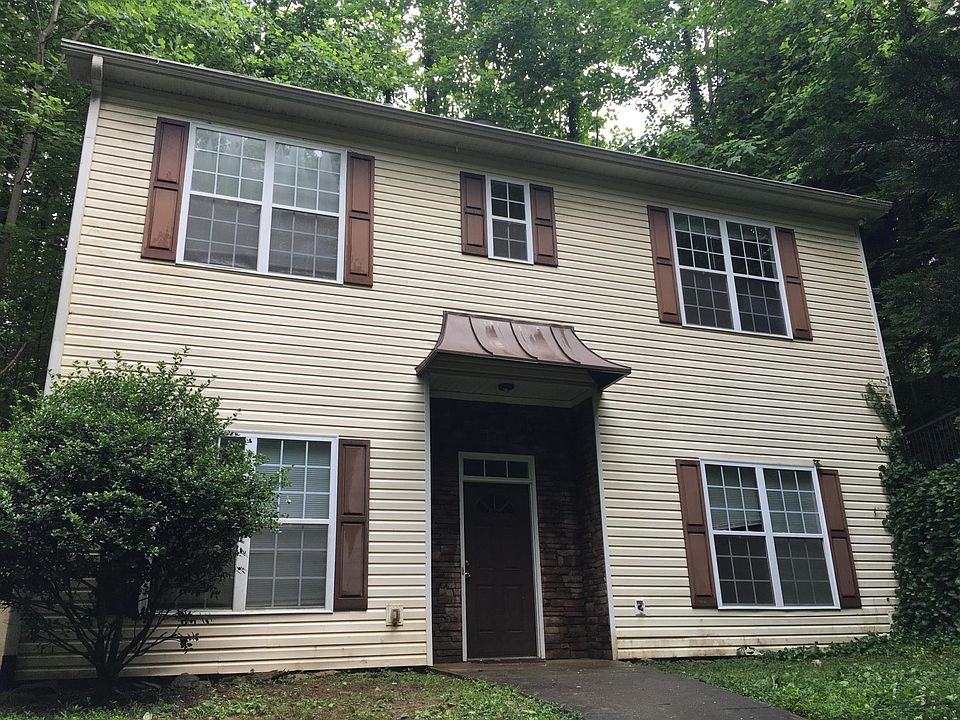 2 story home on raised lot with lots of privacy from tree co