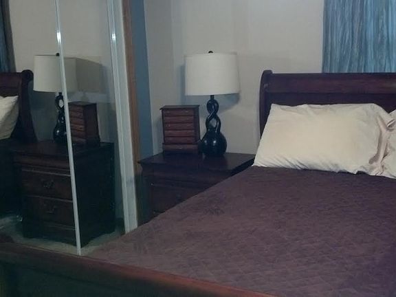 bedroom 1 - mirrored closet