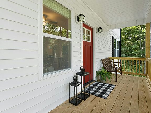 Inviting front porch elevated above main road