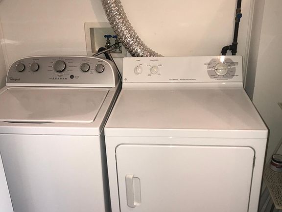 Full size washer and dryer located on the second floor.