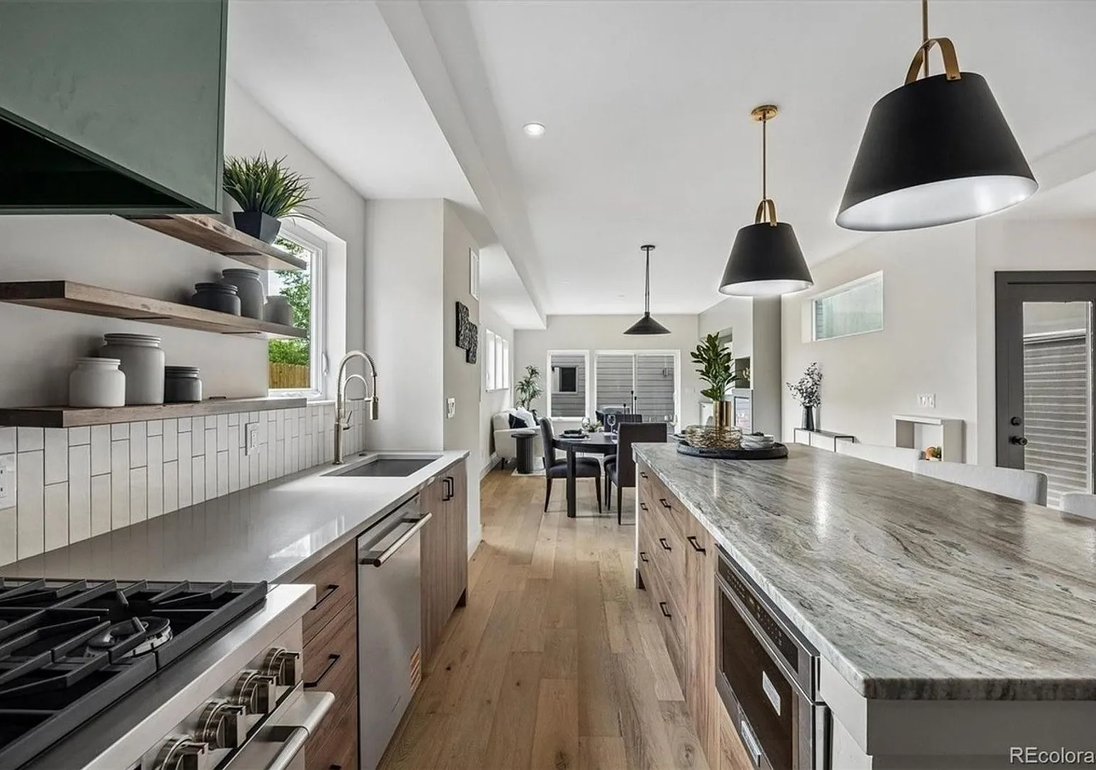 Brand-New Modern 4BR Home with Rooftop Deck & Mountain Views in Overland — Photo 3