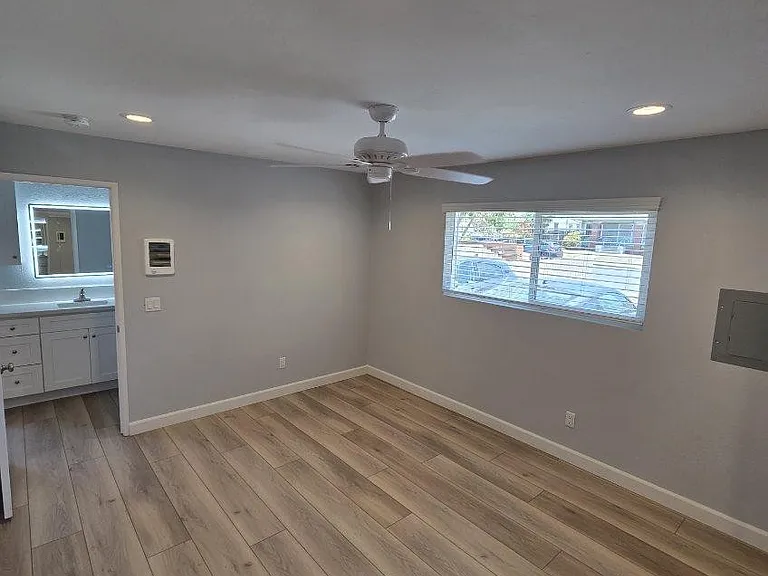 The large windows in the bedroom allow for a lot of natural light. Brand new recessed cans.
