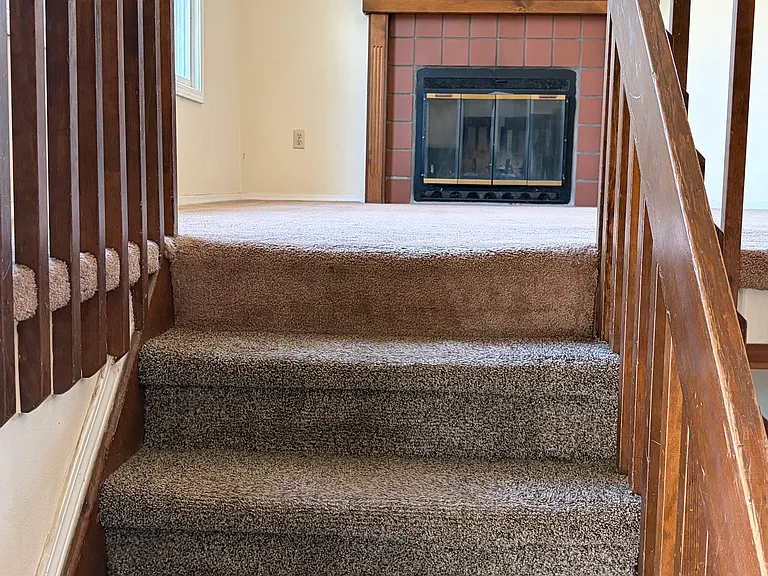 From Entry Looking Up to Living Room