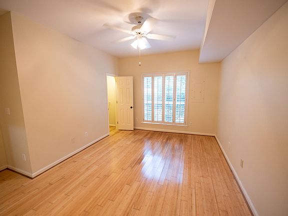 Master bedroom boasts a ton of light, en suite bathroom and beautiful plantation shutters