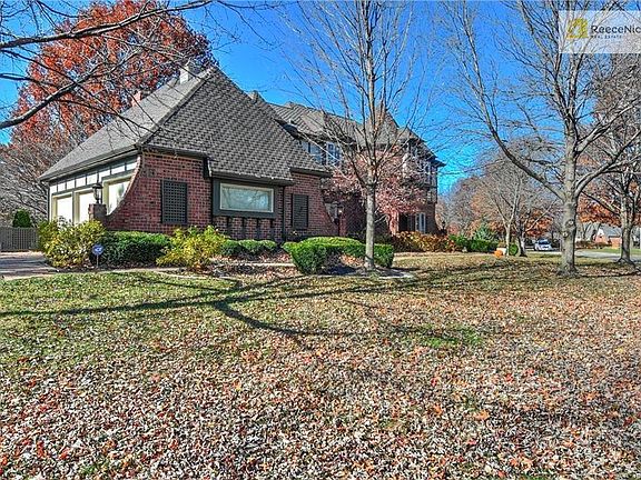Expansive Lot with Mature Trees and Landscaping.