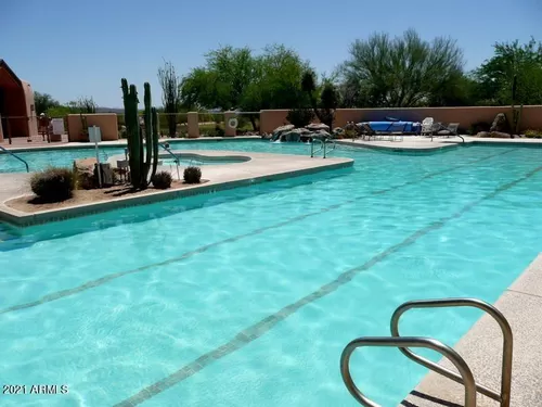 HEATED OLYMPIC SIZE POOL AND SPA. WATER VOLLEY BALL, FITNESS CENTER. - 27808 N Desierto Dr