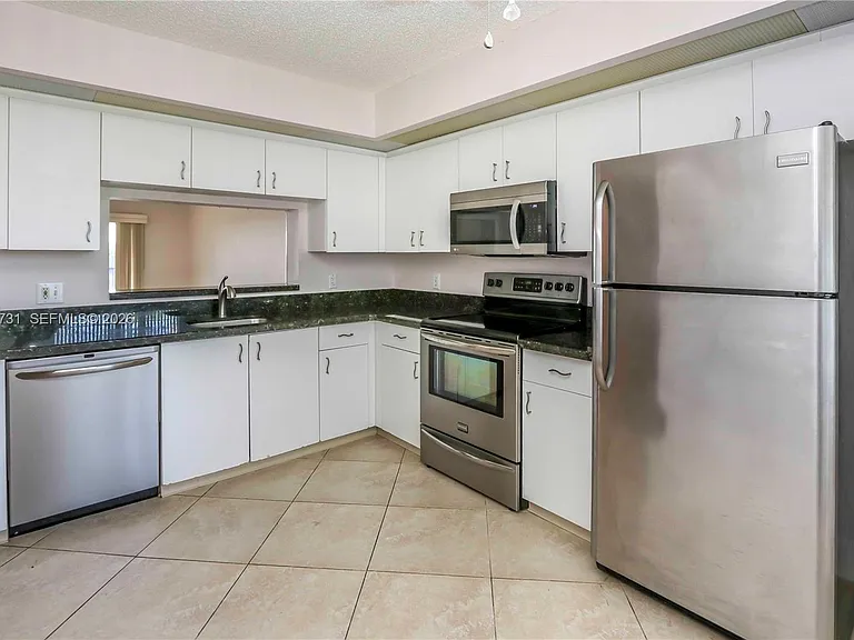 850 SW 138th Ave #409D — Photo 6