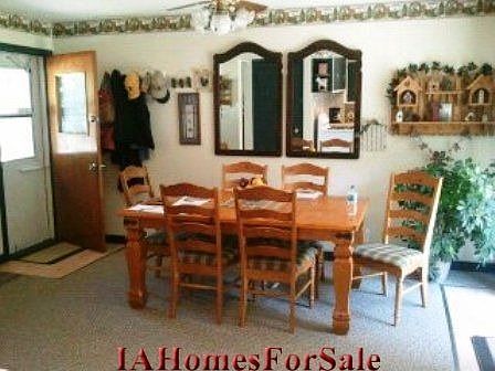 Dining Area-new carpet-lots of lighting. Sliding Glass door leads to deck, private back yard and Jones park