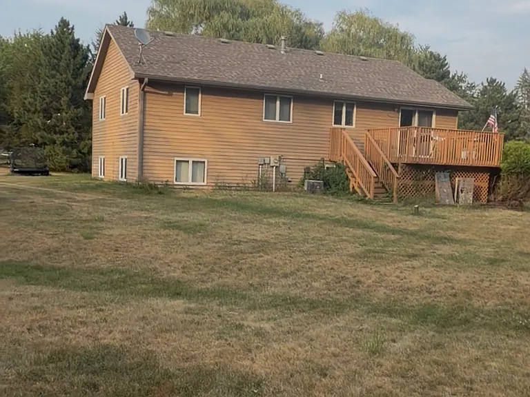House from the back yard. Large 1.2 acre lot.