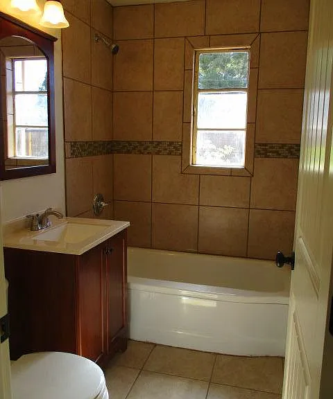 full bath, all new tile, and fixtures