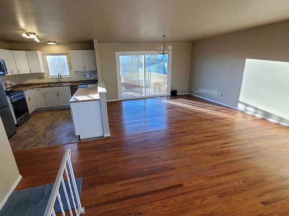 Open concept kitchen, dining and living room