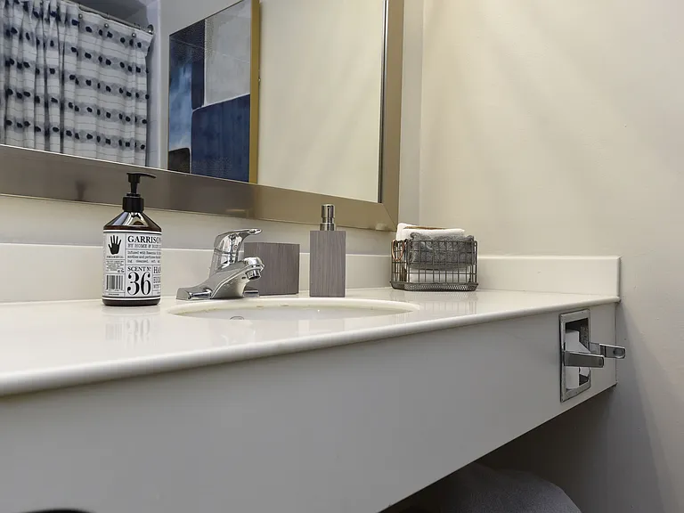 Bright bathroom with quartz counters