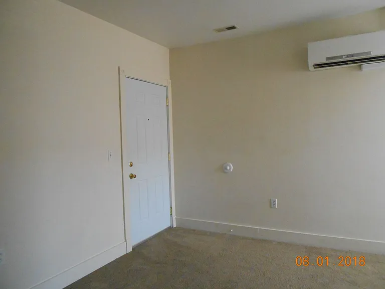 312-16 E 1st St — Photo 8