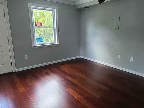 Spacious living / dining area; new hardwood floors throughout