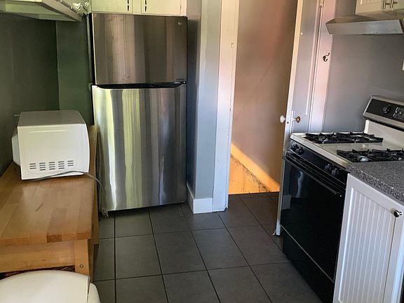 Kitchen with door to basement