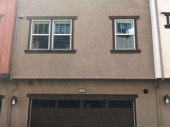 Back of house, with two car garage