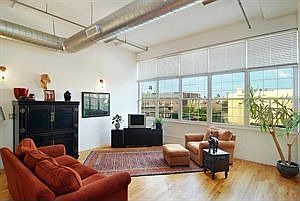 living room, note full wall of windows