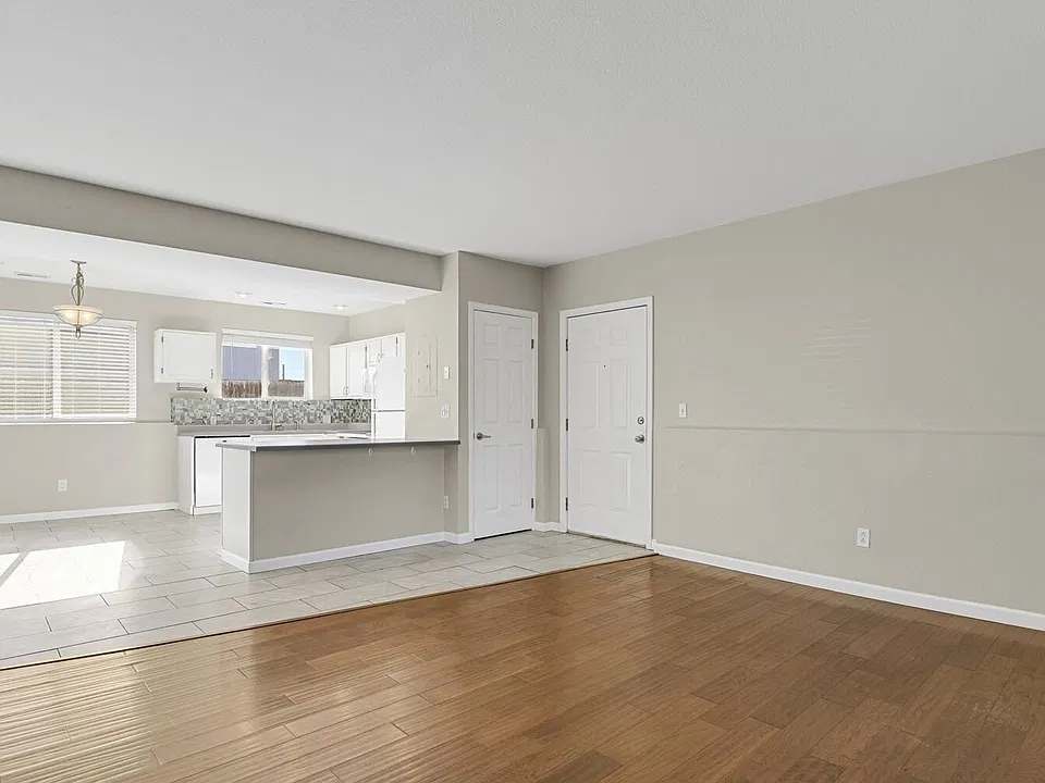 Front door and kitchen from living room