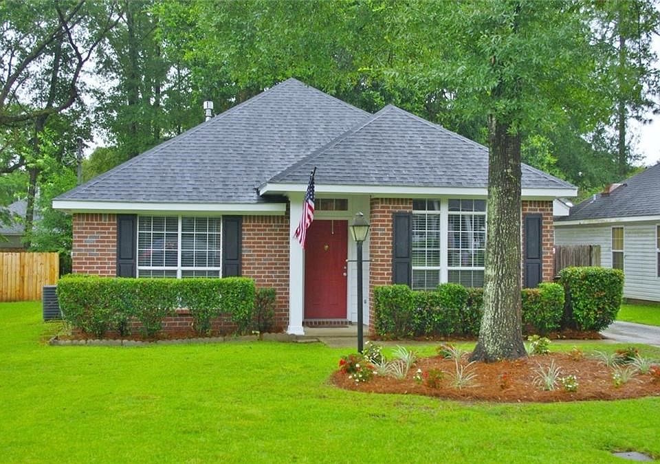 Front View of this Lovely Brick Home....New 30 Year Roof in June, 2018... All New Paint Inside and Out