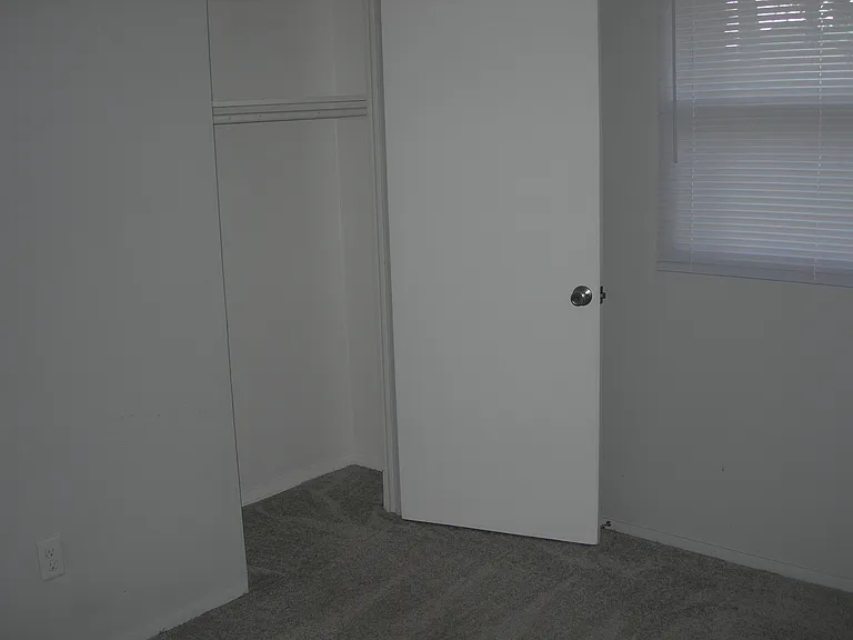 Carpeted bedrooms.