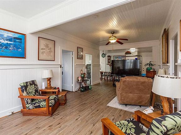 Living area facing towards dining area.